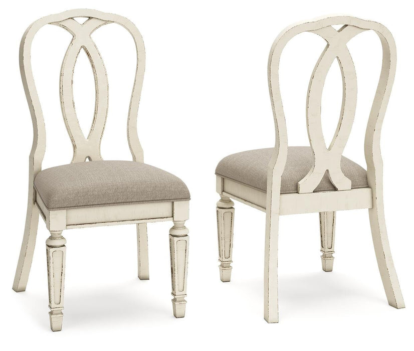 Realyn Chipped White Dining Collection
